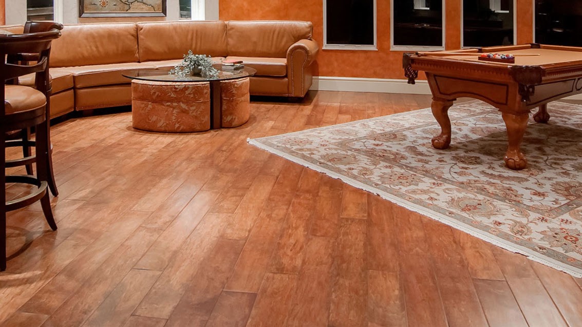 Finished hardwood floor in a Walla Walla games room with pool table